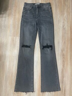 High-Rise Black Distressed Flare Jeans